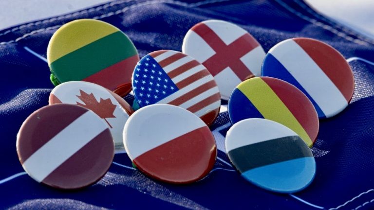 Button badges showing national flags