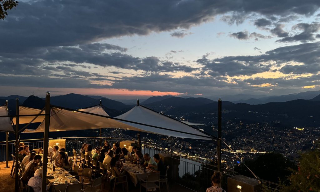Evening dinner of the Lugano Summer School with a view over Lugano